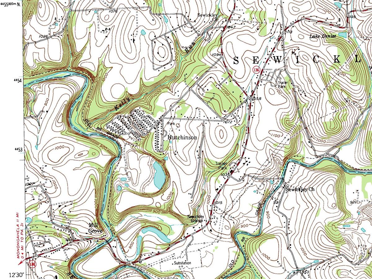 A printed topographic map with contour lines, creeks, roads and the town of Hutchinson.